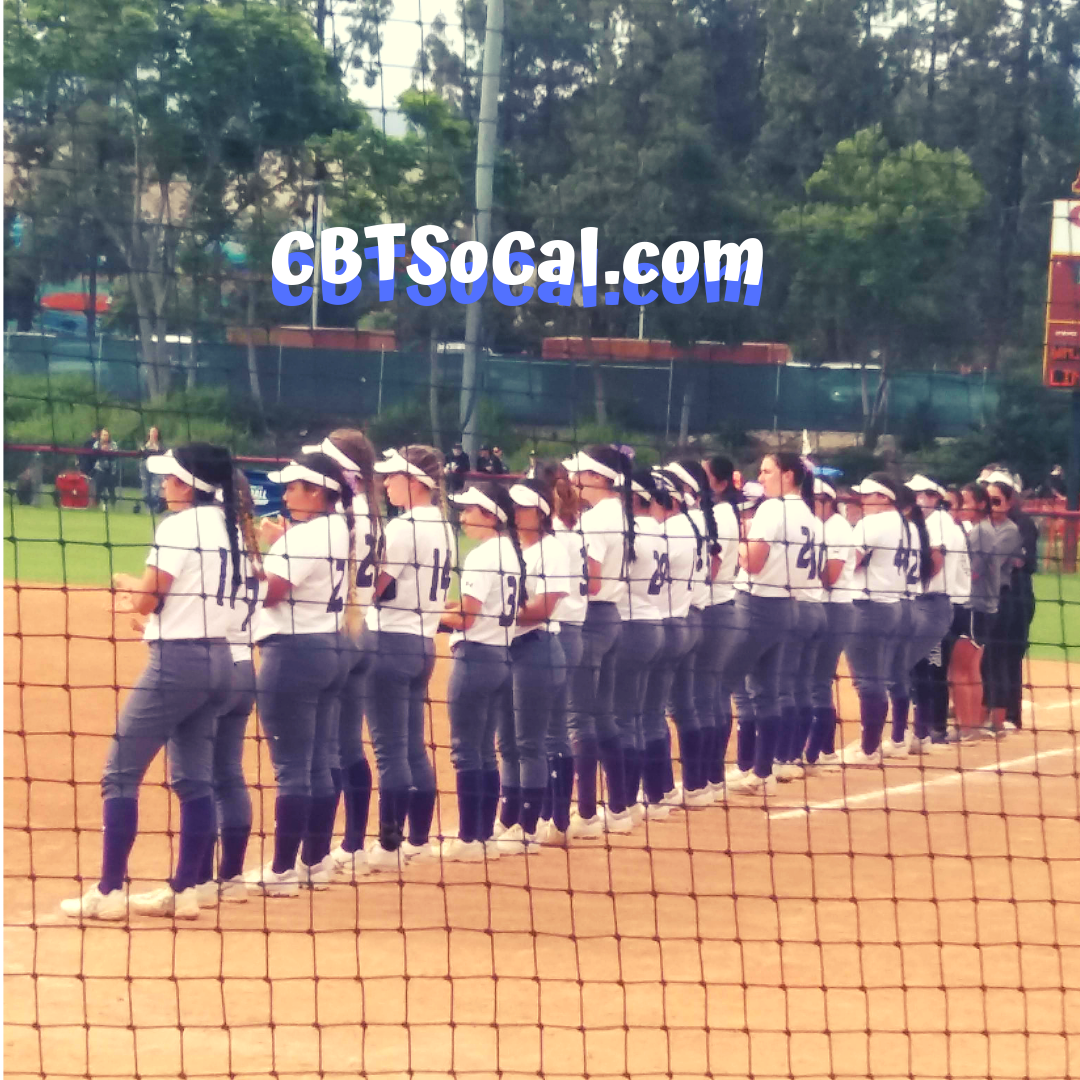 The Whittier College women's softball team line up on the field before the championship game